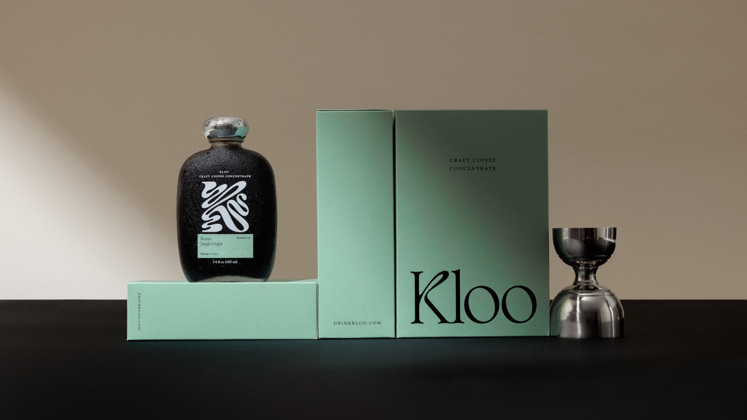 Kloo coffee concentrate and its green packaging.